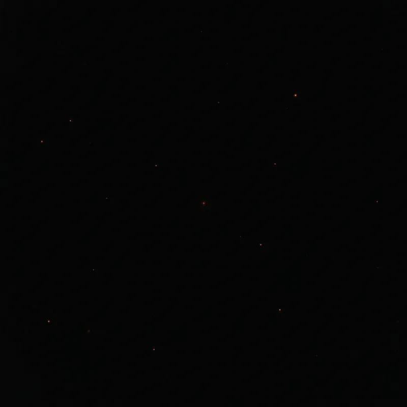 Vast dark empty cosmos with only faint last-burning stars showing approach to heat death